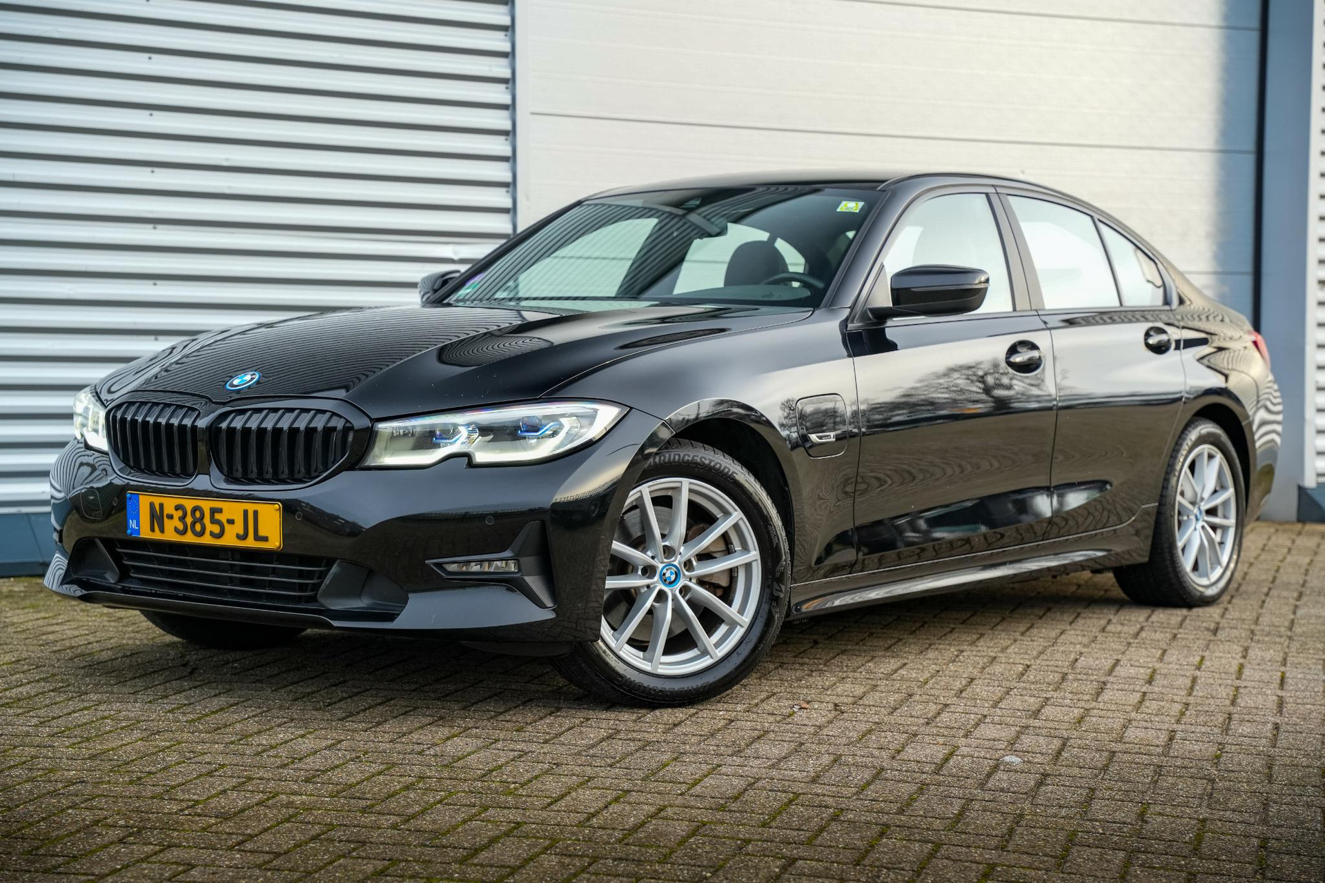 BMW 3-serie 320e Business Edition Plus 2021 Schwarz uni 27