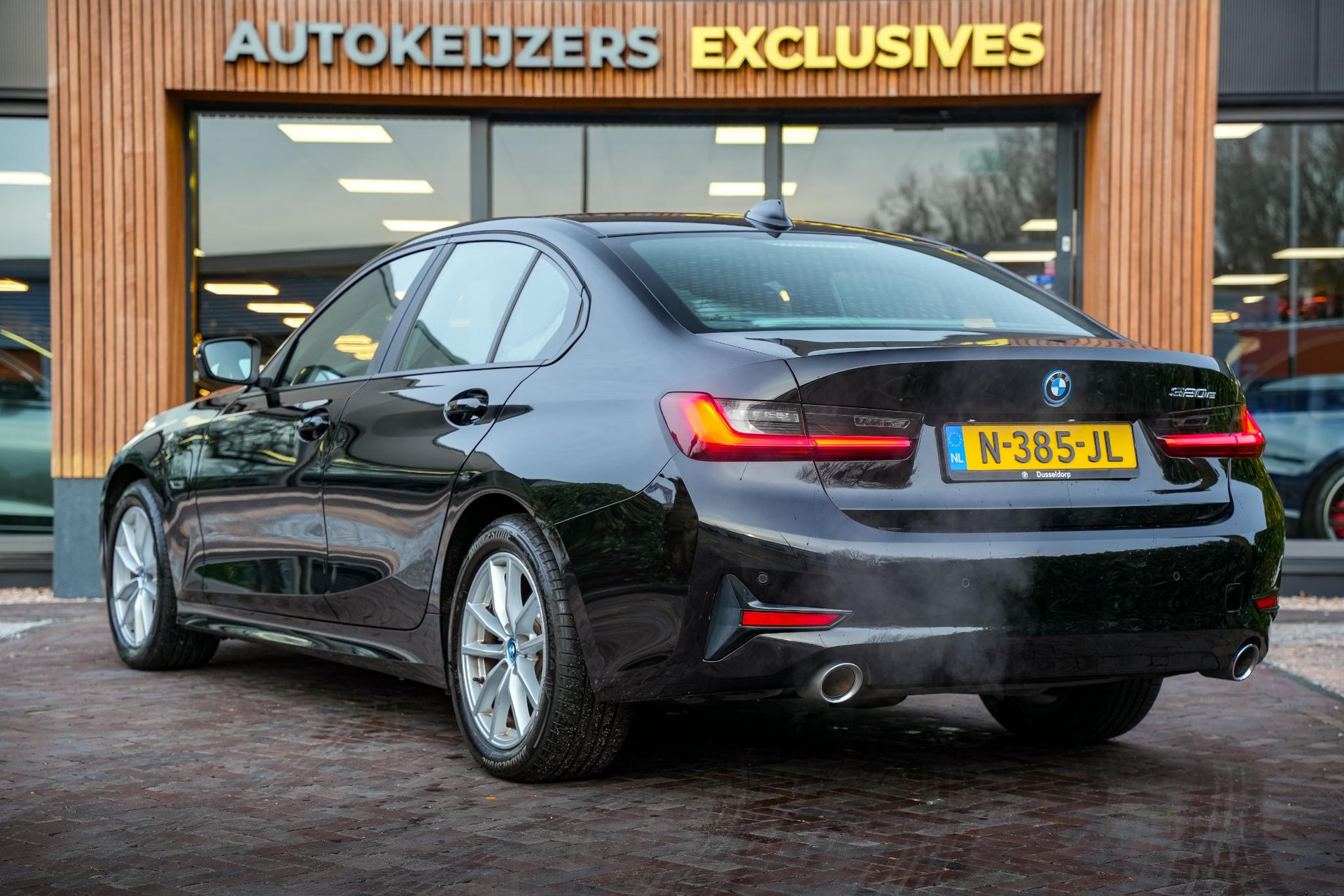 BMW 3-serie 320e Business Edition Plus 2021 Schwarz uni 7