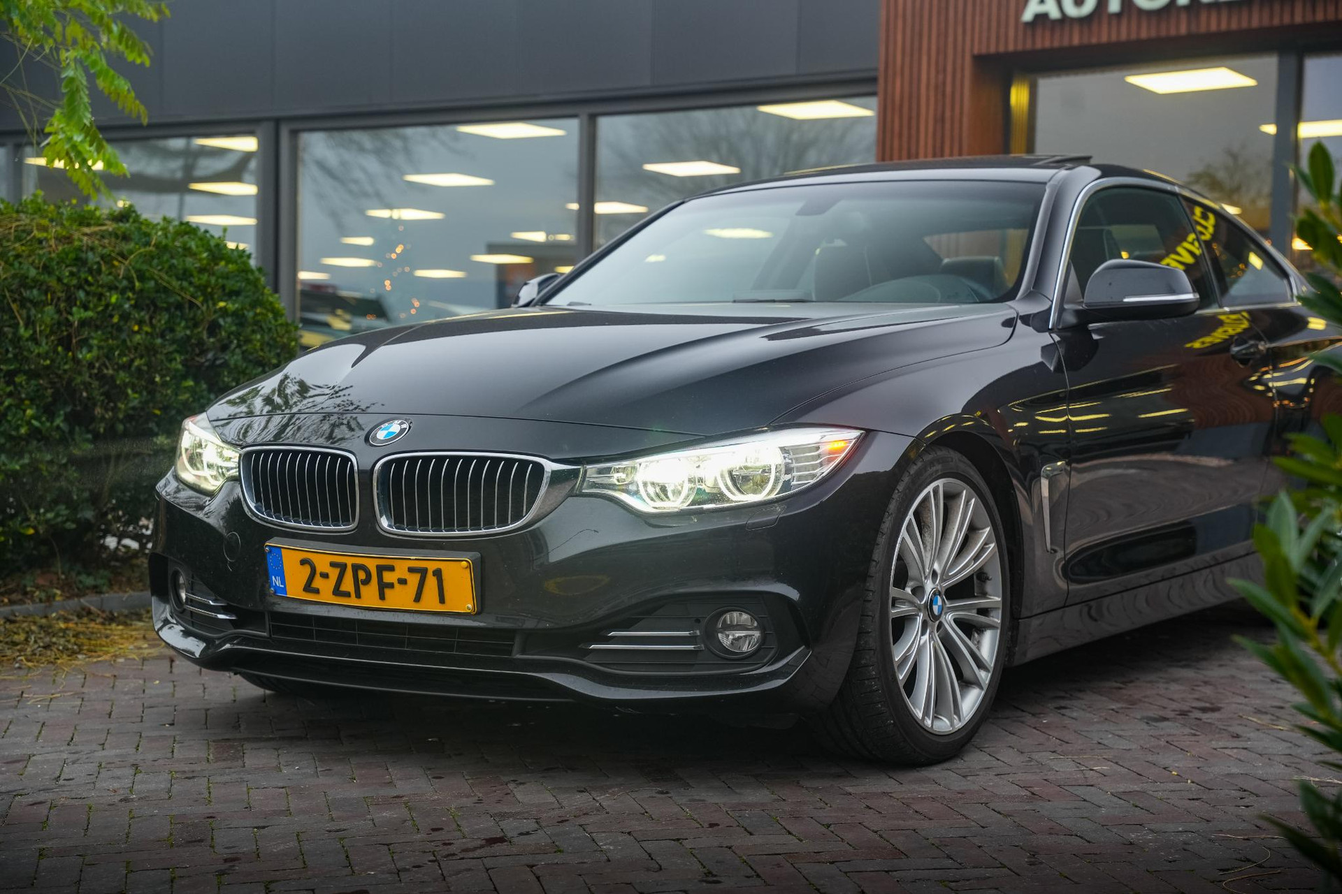 BMW 4 Serie Coupé 428i High Executive 2015 Saphirschwarz metallic 13
