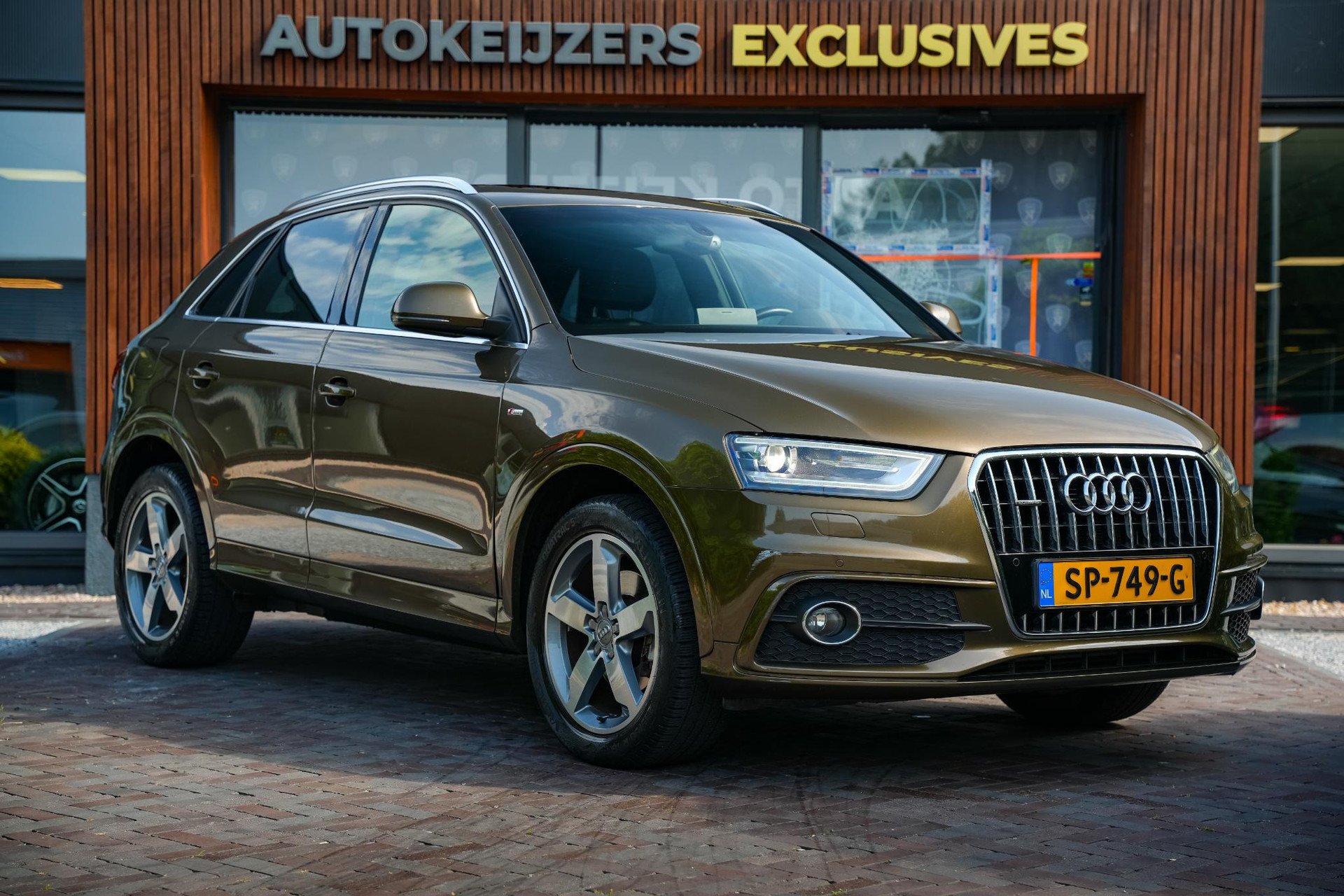 Audi Q3 2.0 TFSI quattro Pro Line 2012 Caribou brown metallic (6M) 1