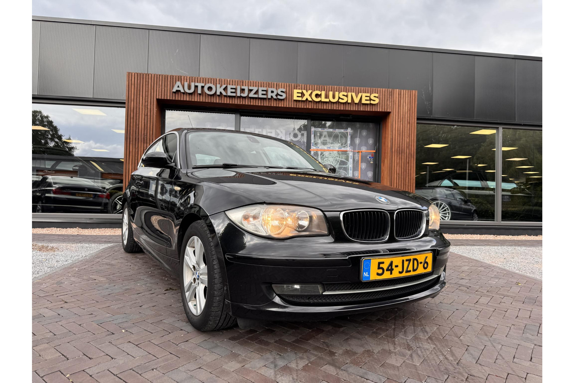 BMW 1-serie 118i Business Line 2009 Saphirschwarz metallic 1