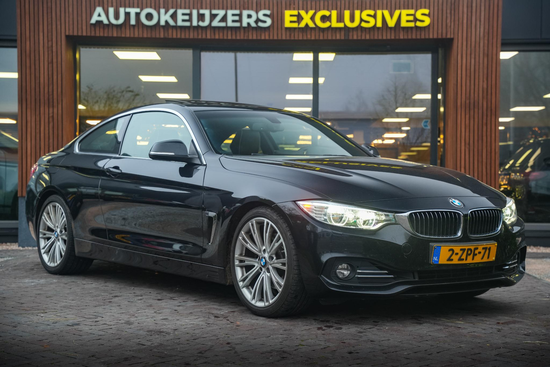 BMW 4 Serie Coupé 428i High Executive 2015 Saphirschwarz metallic 1