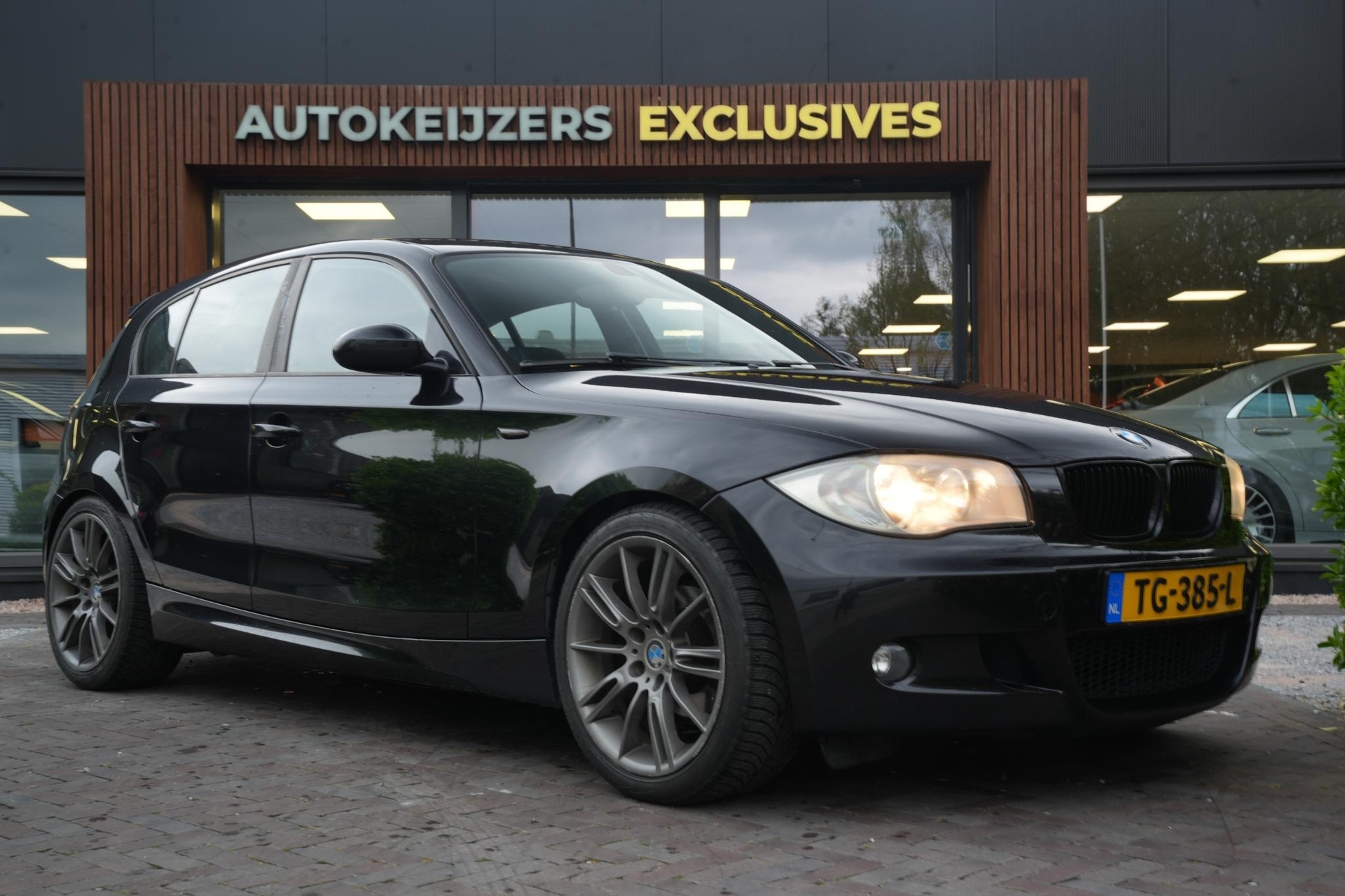 BMW 1-serie 118i 2006 black-sapphire metallic (475) 1