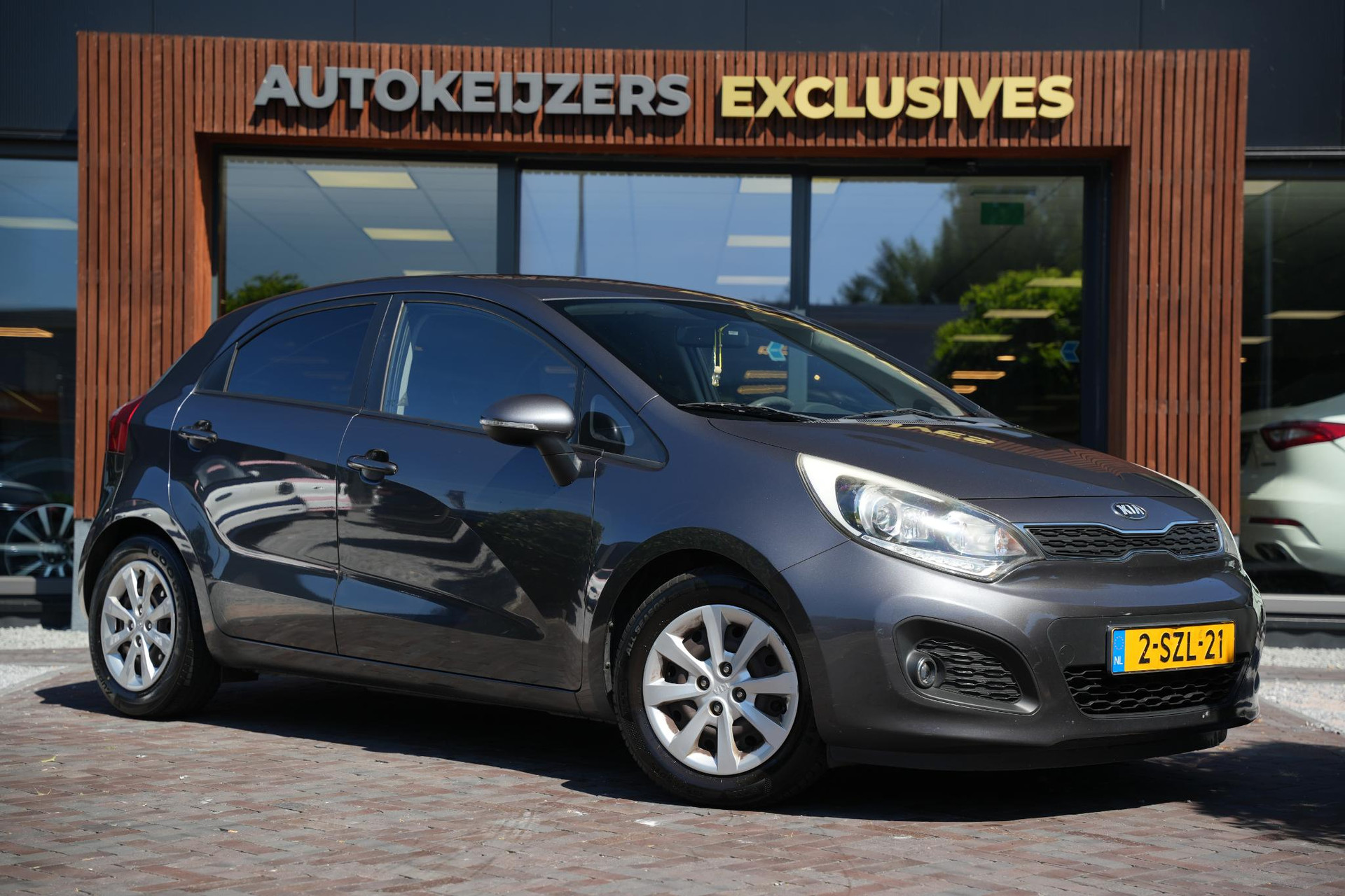 Kia Rio 1.2 CVVT Plus Pack 2014 Platinum Graphite Metalli (ABT) 1